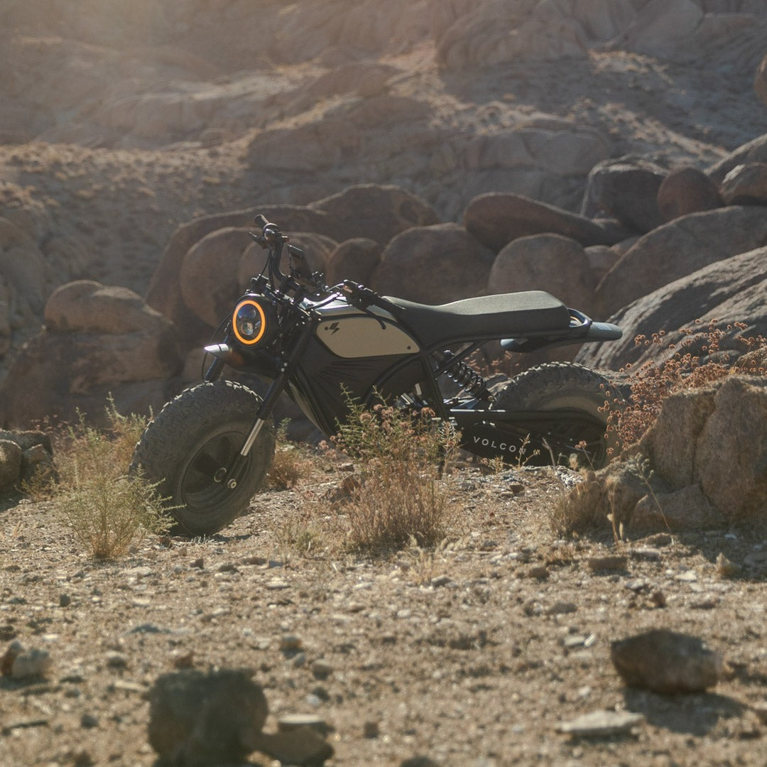 Grunt Evo Electric Motorcycle featured on rocky terrain 